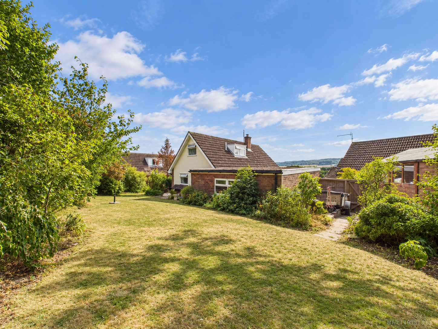 Sunny Suburban Garden and House