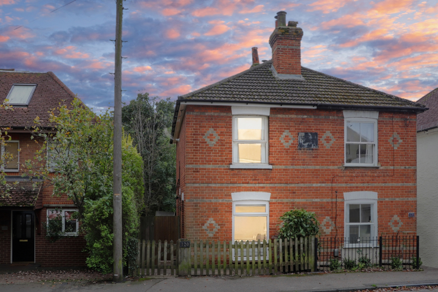 Front view of the property at dusk
