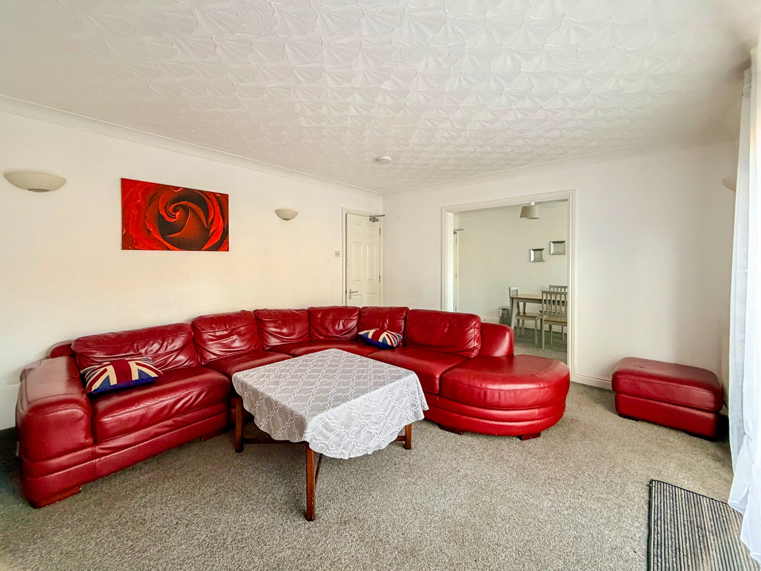 communal lounge with access to garden and dining area