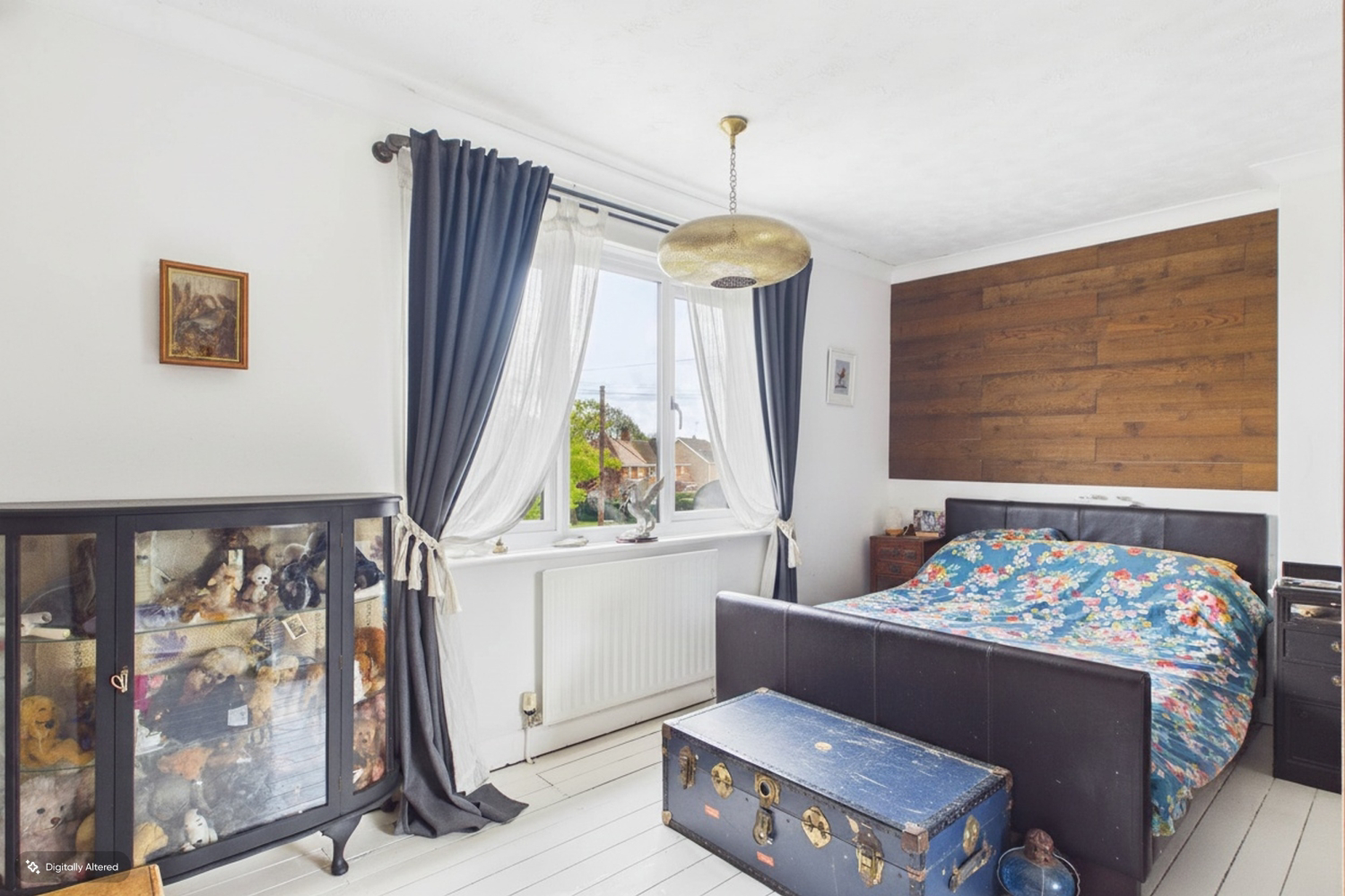 The beautiful light main bedroom