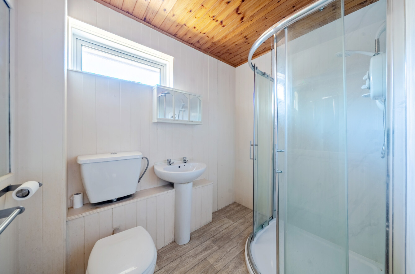 Bathroom With Corner Shower 
