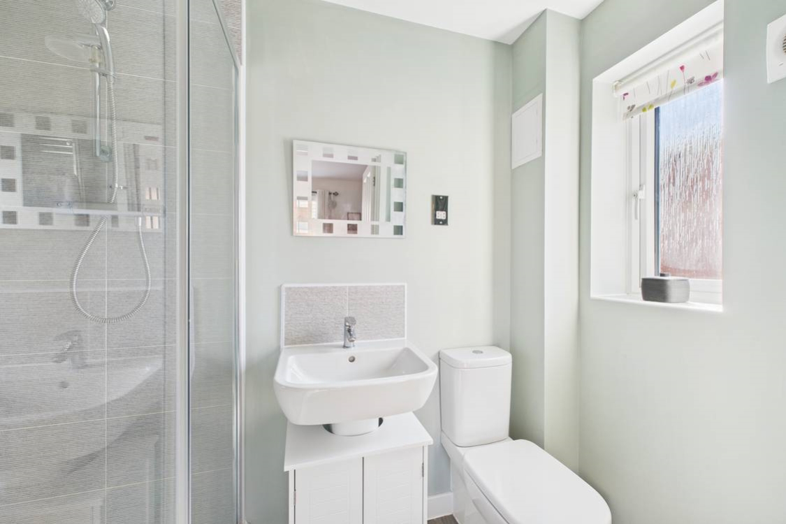 A clean fresh and light en suite giving you your own space without the queue for the bathroom