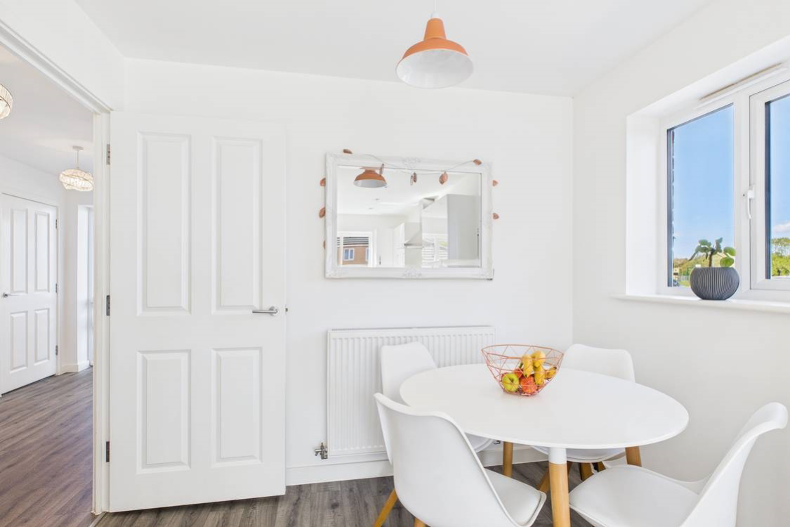 Another window to allow the natural light to fill this beautiful space and with a view over the green open space and park