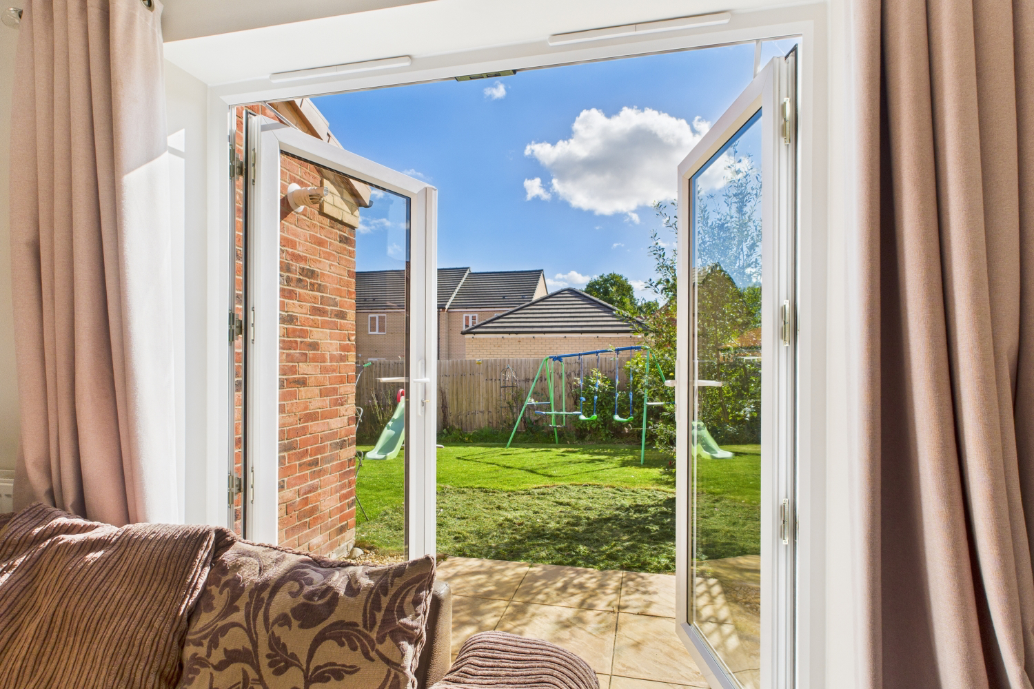 Throw open the patio doors and step straight from the living room into the garden