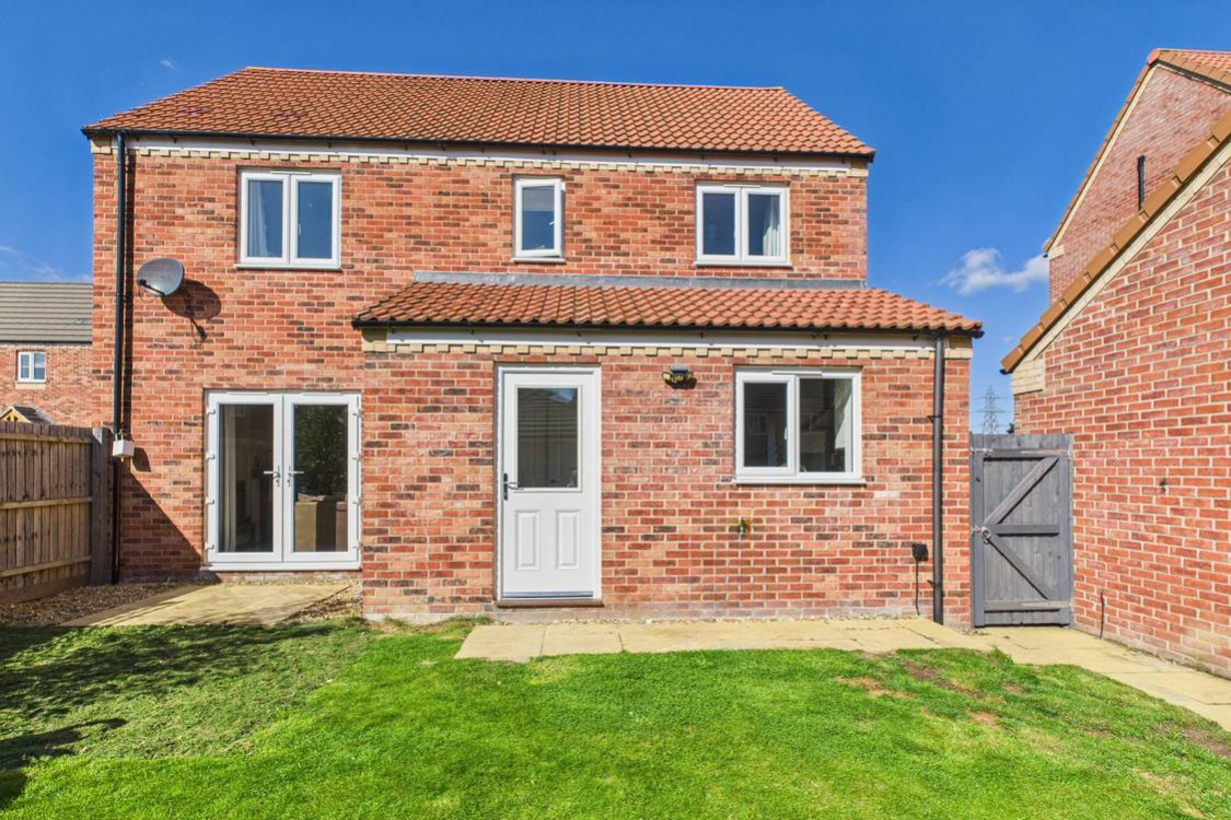 The back garden has ample space for childrens garden toys or for entertaining family and friends 