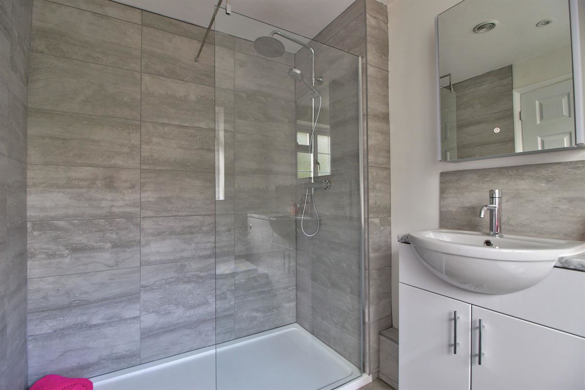 En-suite bathroom with luxuriously large shower