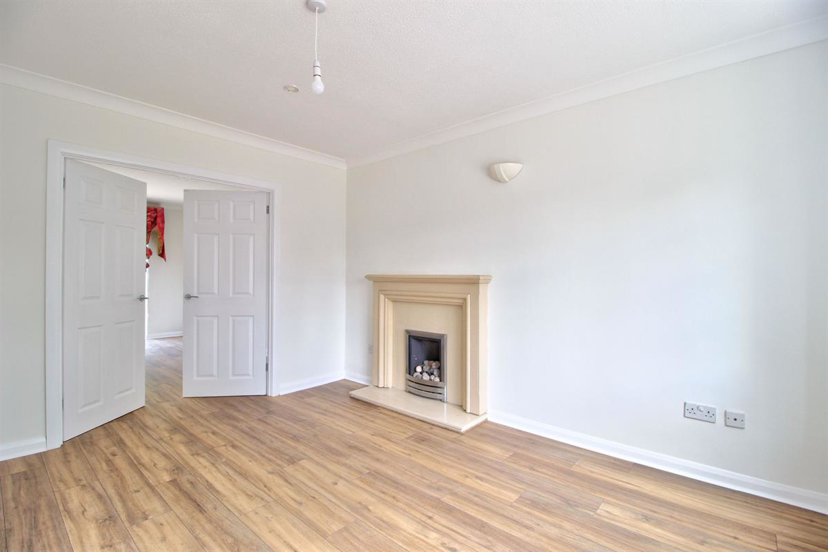 Living Room showing Family Room through Double Doors
